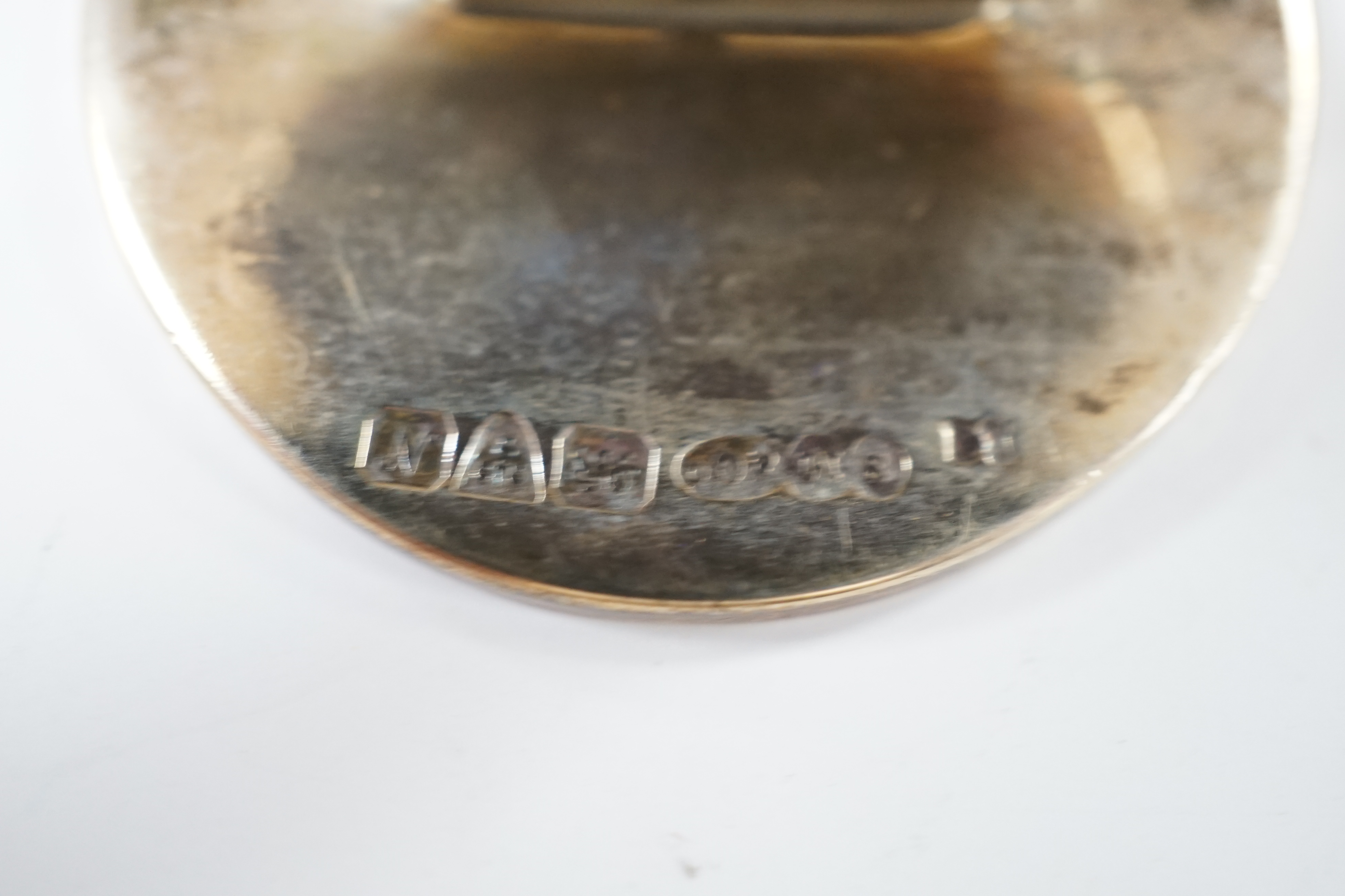 A silver mounted capstan inkwell, Birmingham, 1914, a silver mounted cigarette box and a cased pair of silver menu holders. Condition - poor to fair